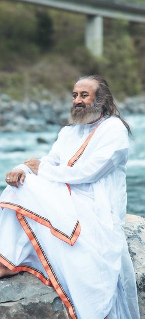 Gurudev sitting on rock on the bank of Ganga