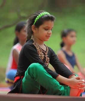 yoga - Causes and Cure of Back Pain in Children