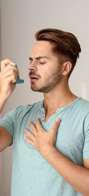 Healing Asthma with Ayurveda man with inhaler